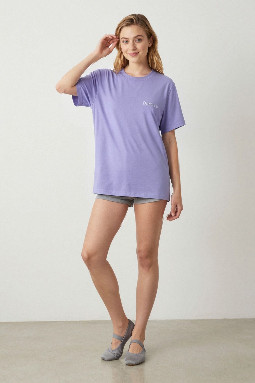 lavender t-shirt on female model in desert adventure setting professional fashion photography