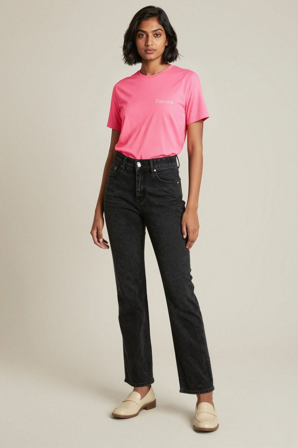 pink t-shirt on female model in studio neutral setting professional fashion photography