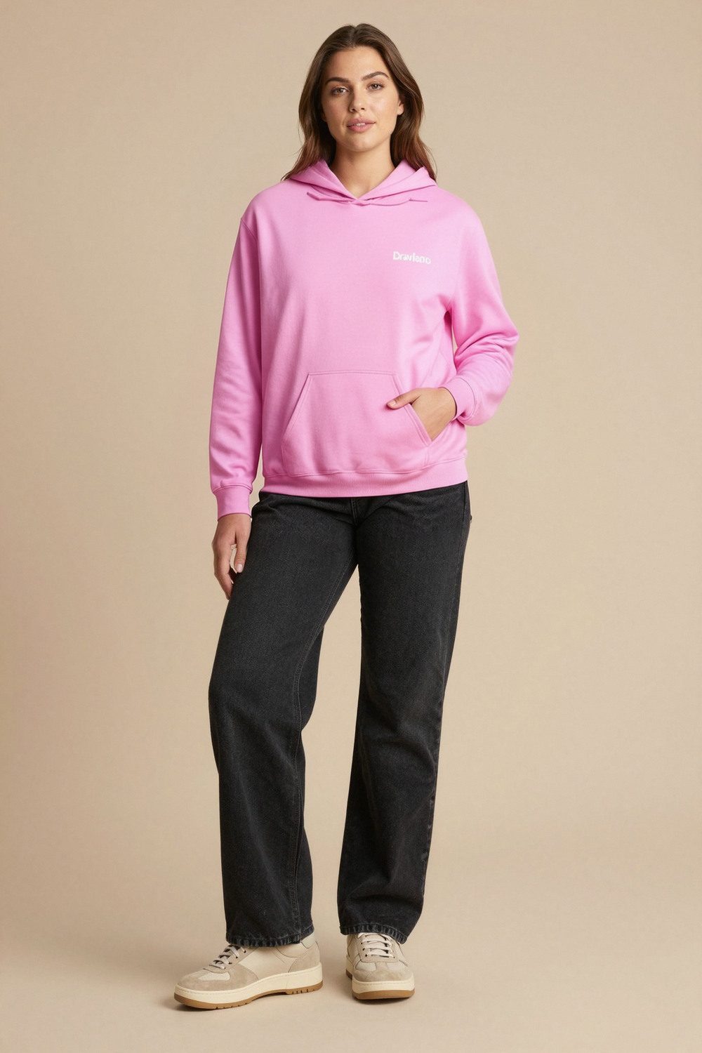 black hoodie on female model in studio neutral setting professional fashion photography