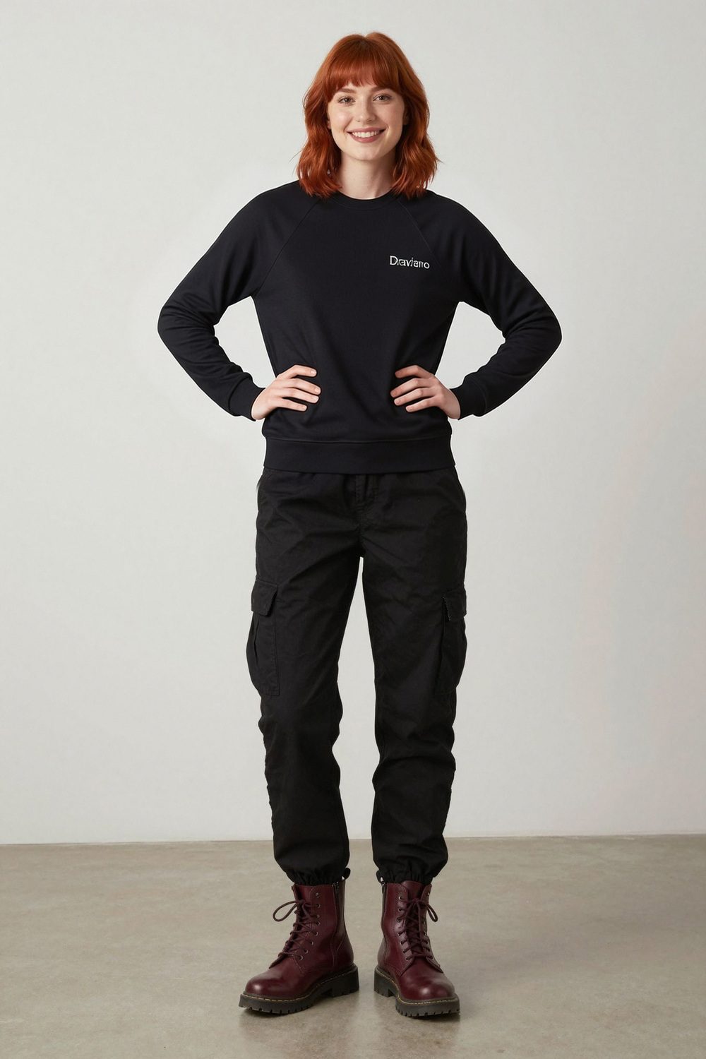 black sweatshirt on female model in rooftop evening setting professional fashion photography