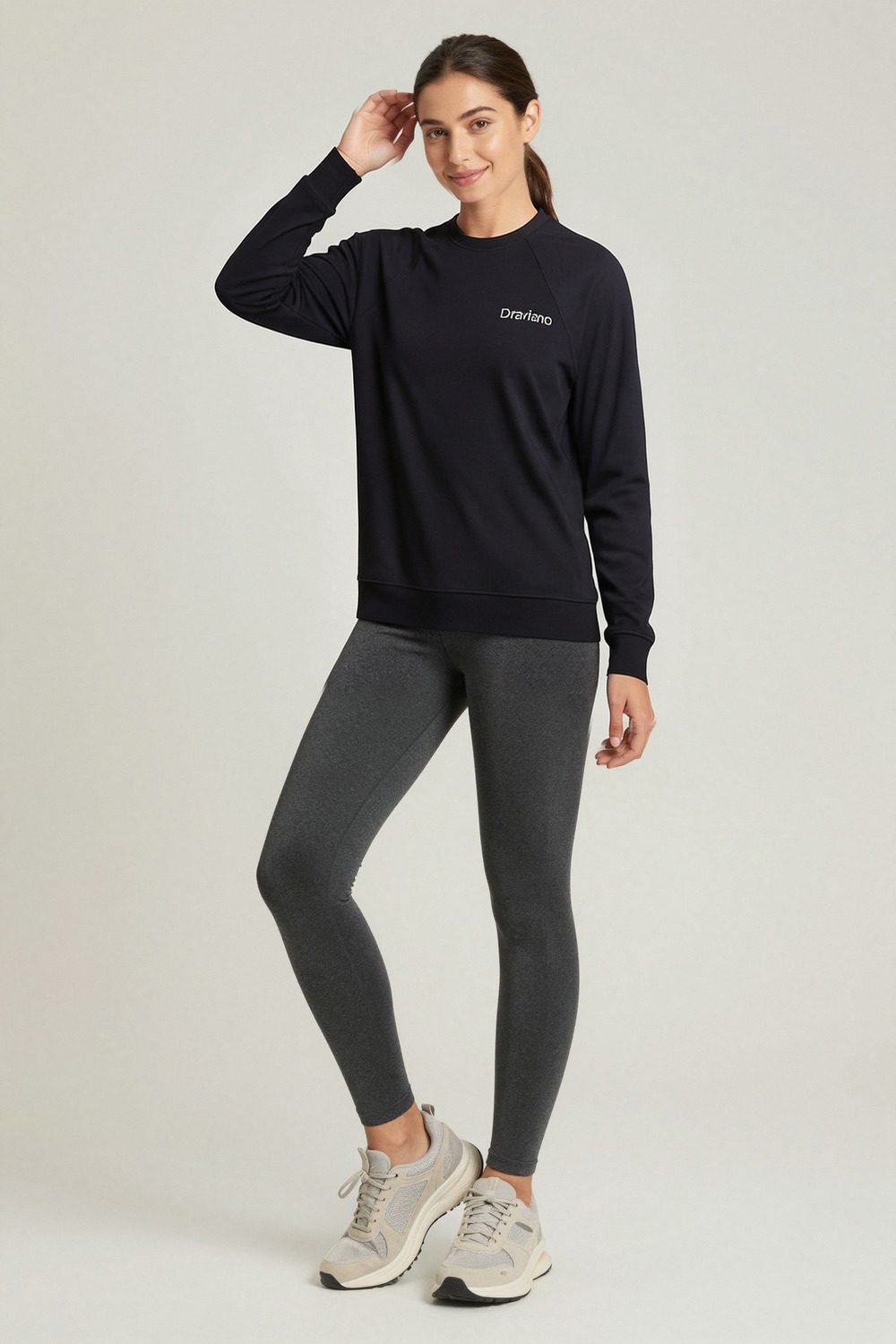 black sweatshirt on female model in urban evening setting professional fashion photography