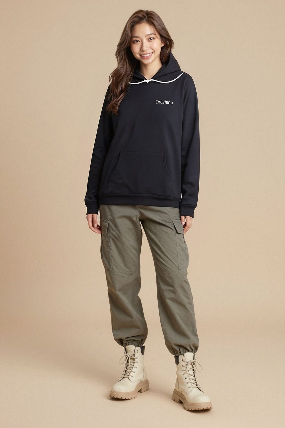 black hoodie on female model in studio neutral setting professional fashion photography