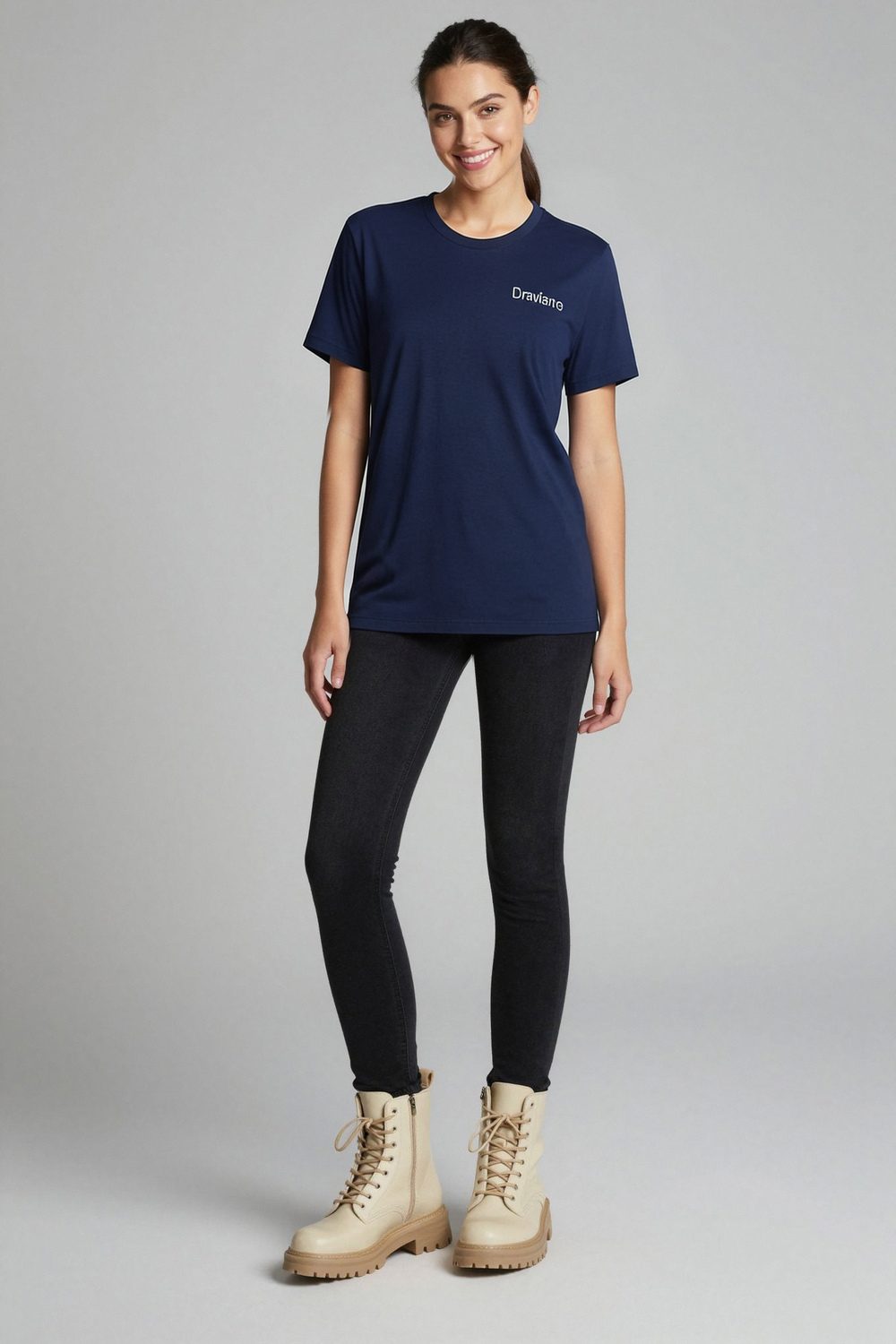 navy t-shirt on female model in studio neutral setting professional fashion photography
