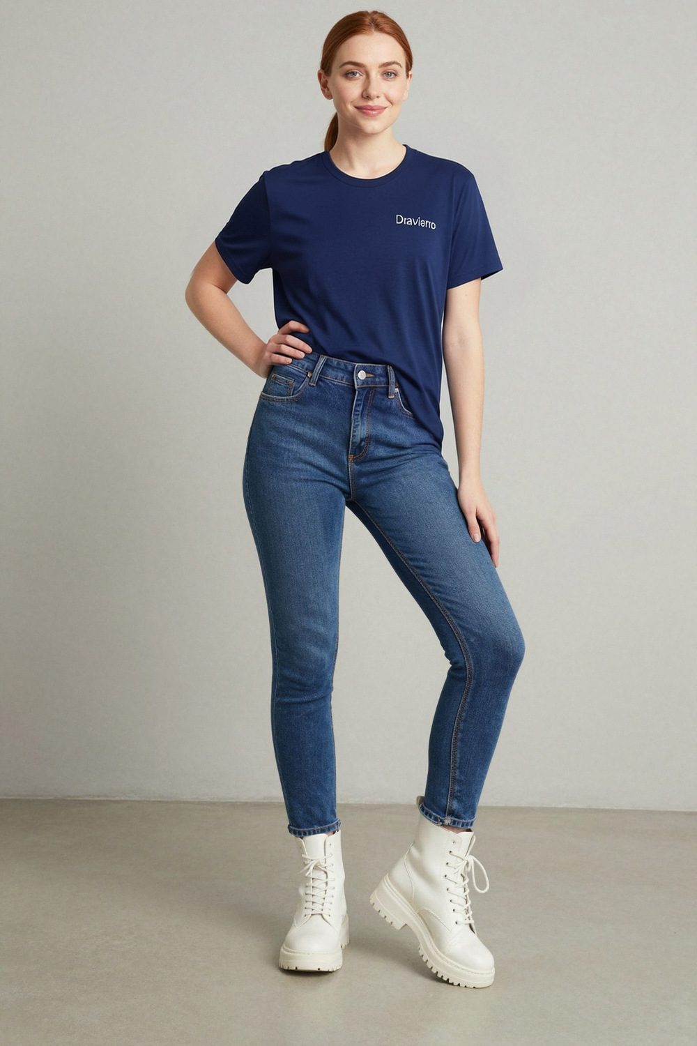 navy t-shirt on female model in studio neutral setting professional fashion photography