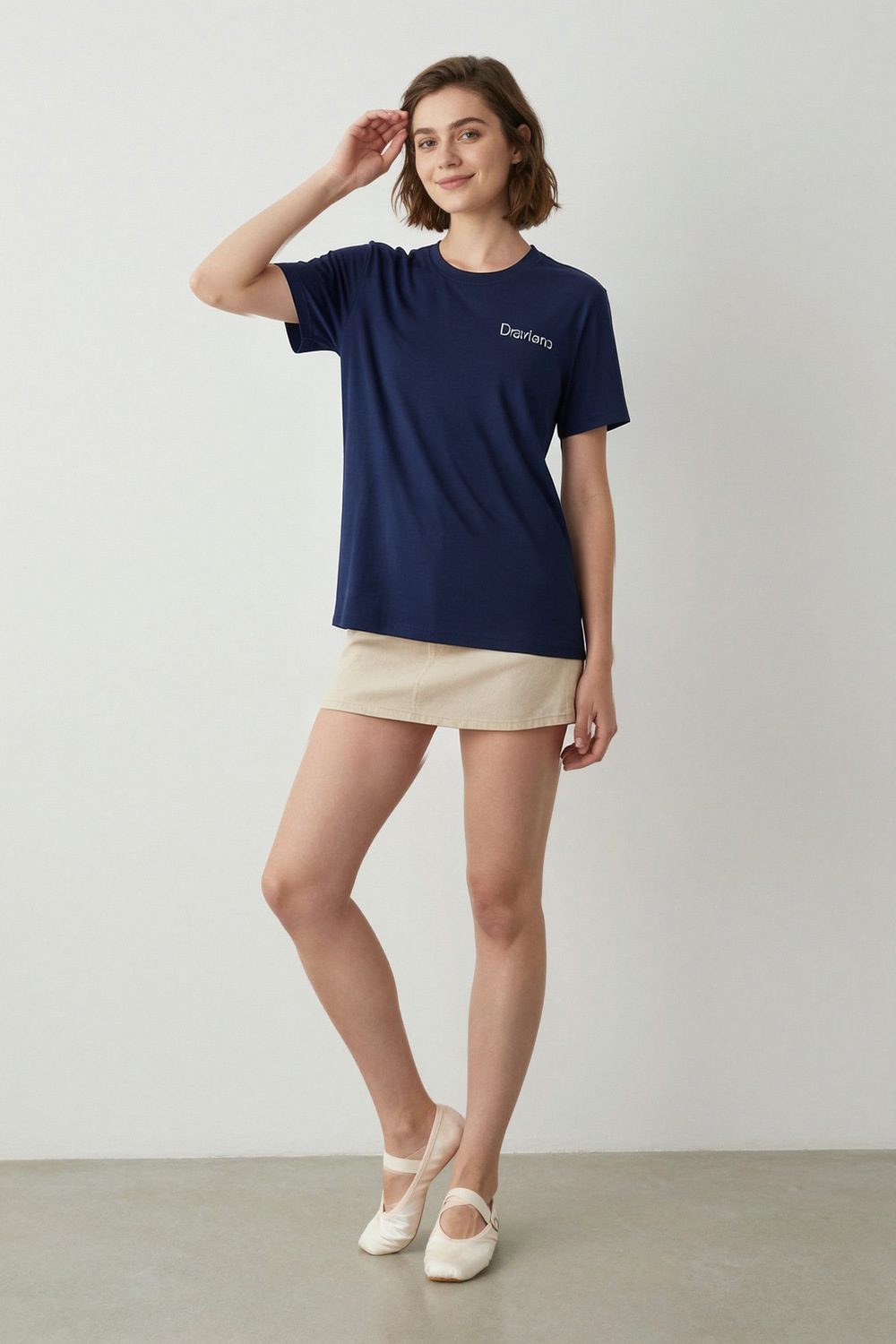 navy t-shirt on female model in beach sunset setting professional fashion photography
