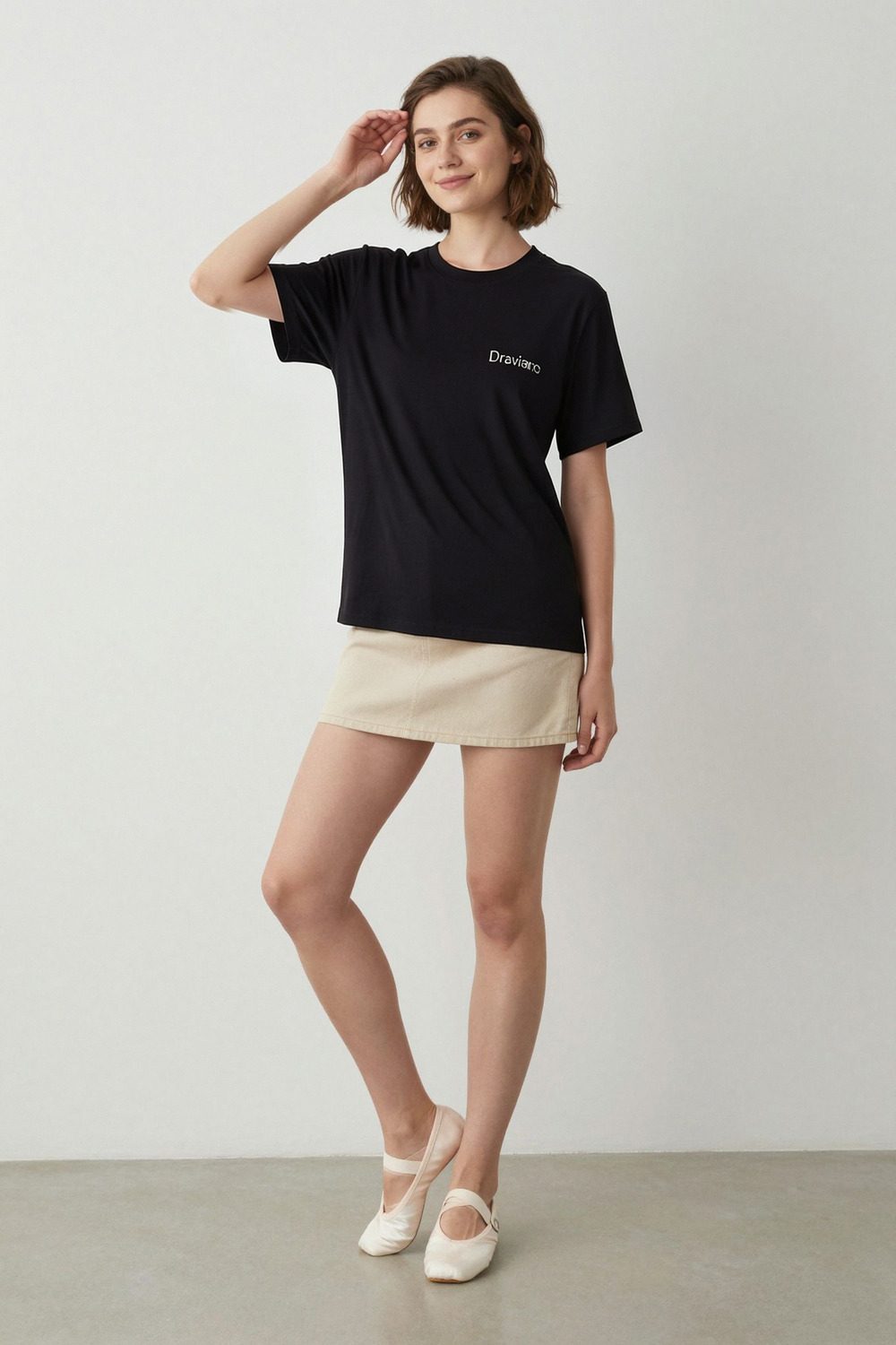 black t-shirt on female model in rooftop evening setting professional fashion photography