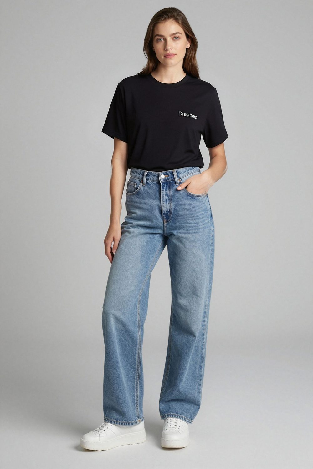 black t-shirt on female model in desert adventure setting professional fashion photography