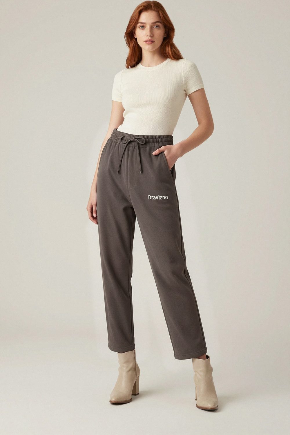 black joggers on female model in desert adventure setting professional fashion photography