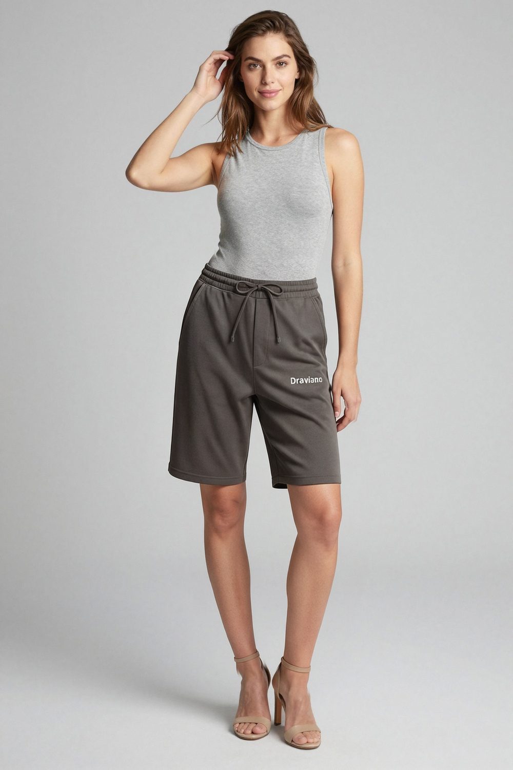black joggers on female model in rooftop evening setting professional fashion photography