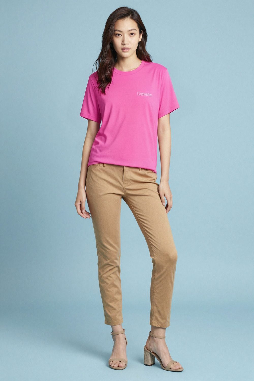 pink t-shirt on female model in coastal scenic setting professional fashion photography