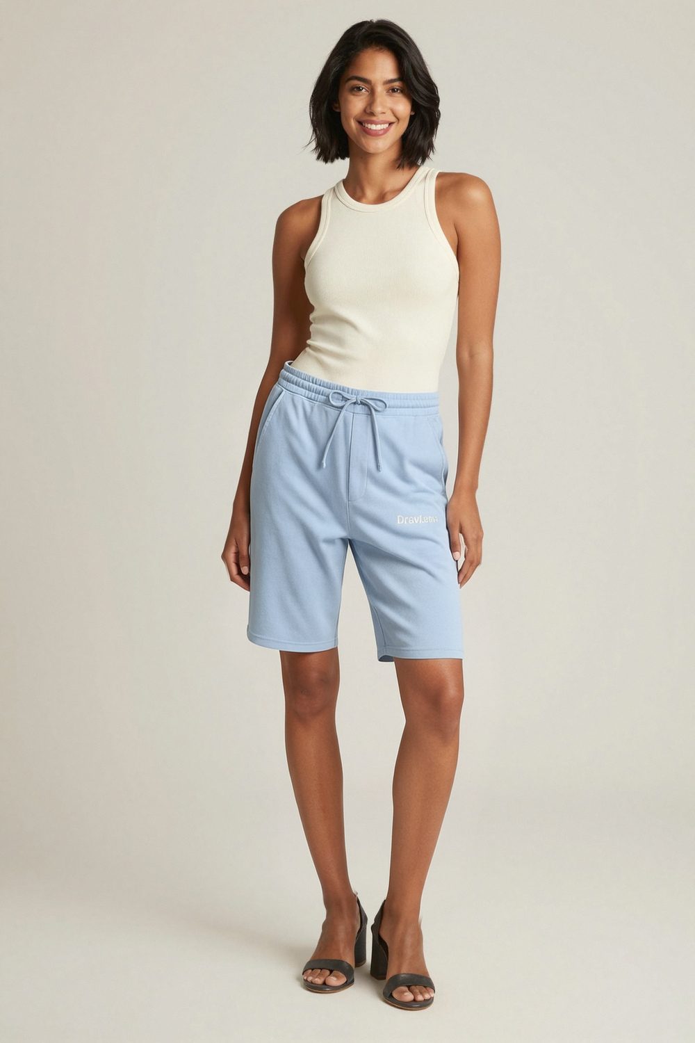 light blue joggers on female model in nature forest setting professional fashion photography