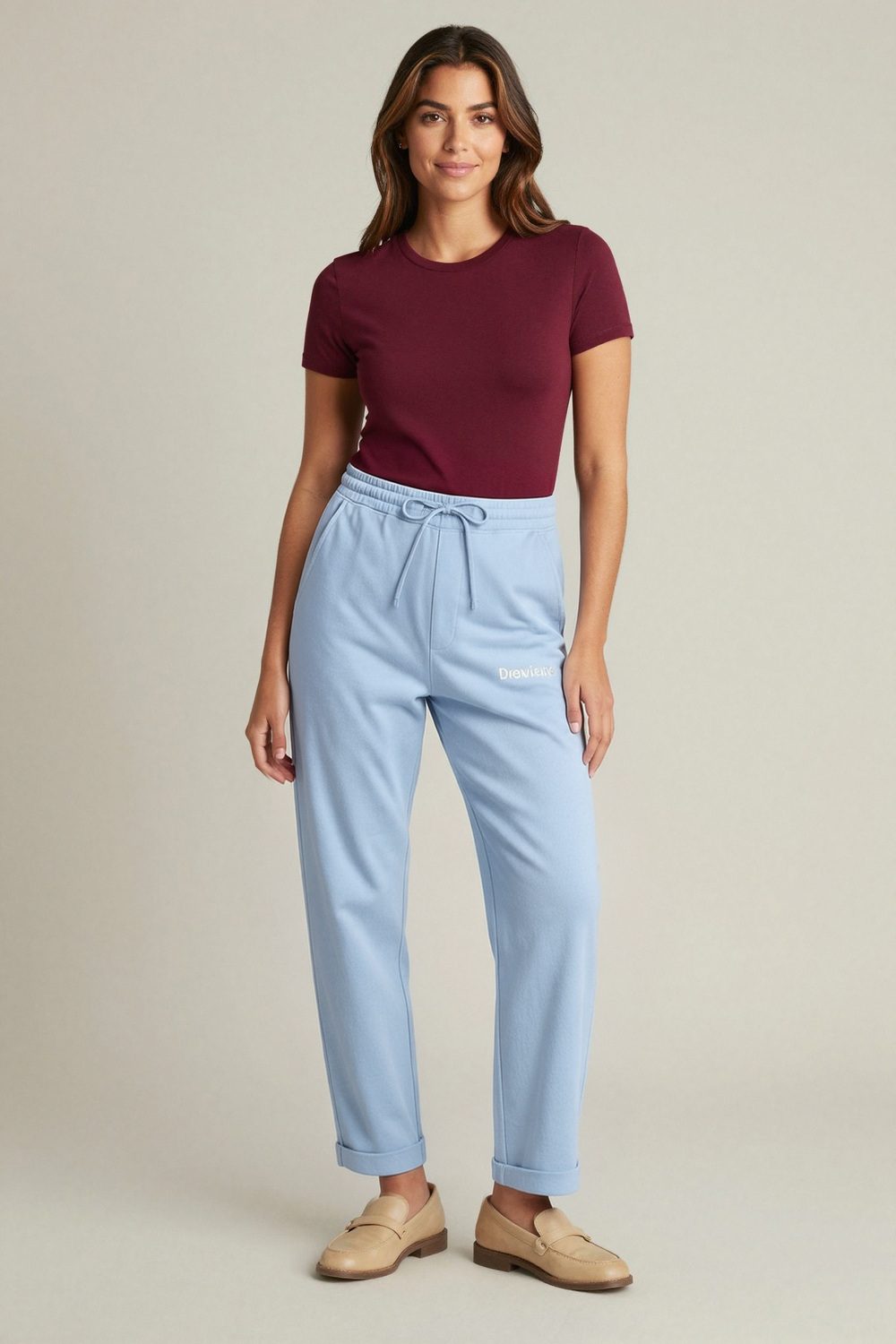 light blue joggers on female model in urban evening setting professional fashion photography