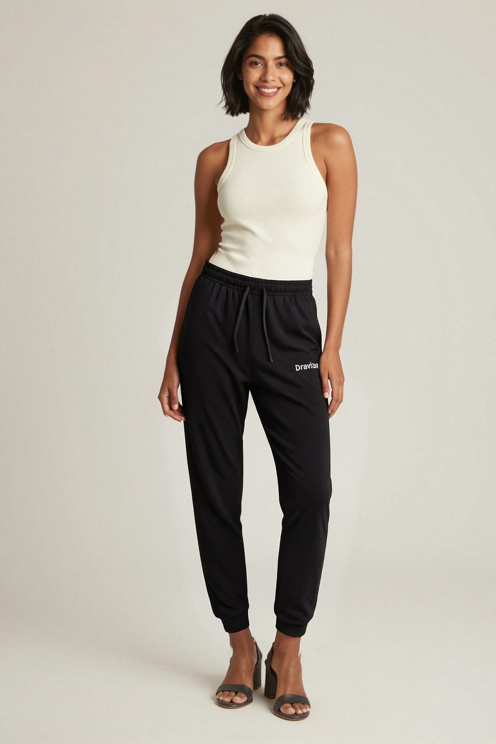 black joggers on female model in urban evening setting professional fashion photography
