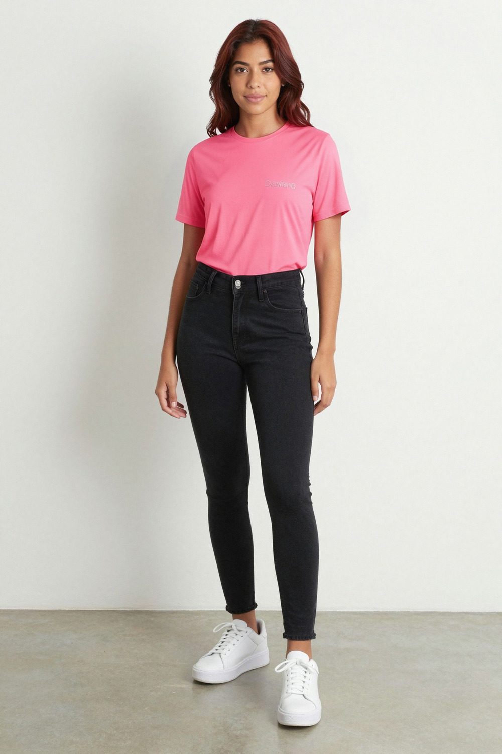 pink t-shirt on female model in rooftop evening setting professional fashion photography